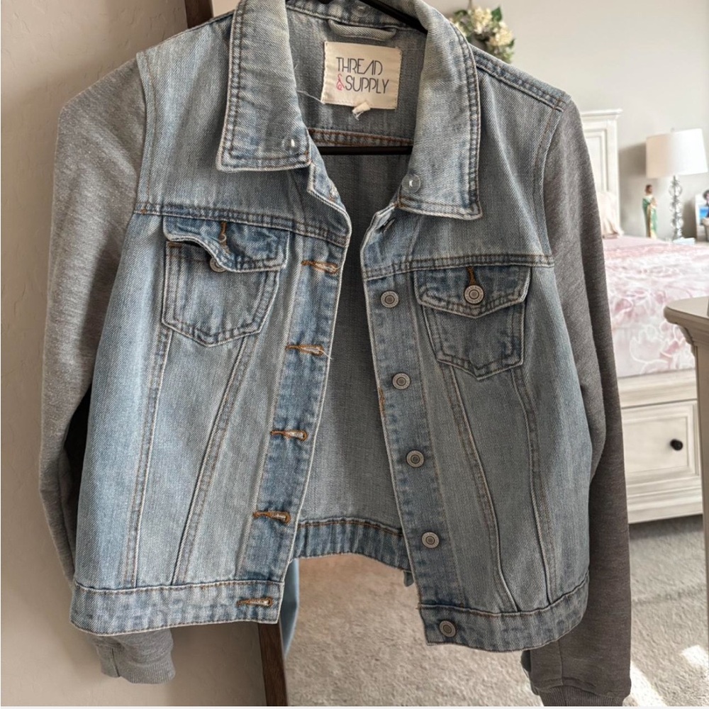 Light wash denim jacket with heather grey sleeves